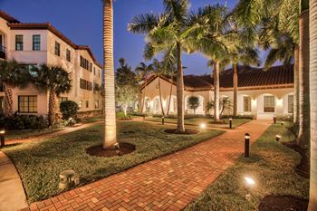 Courtyard at twilight at Mirador at Doral by Windsor, Florida, 33122